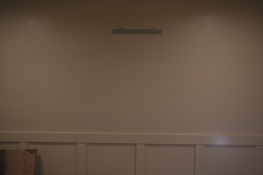 Video of framed art and canvas appearing on a SecurArt wall mount